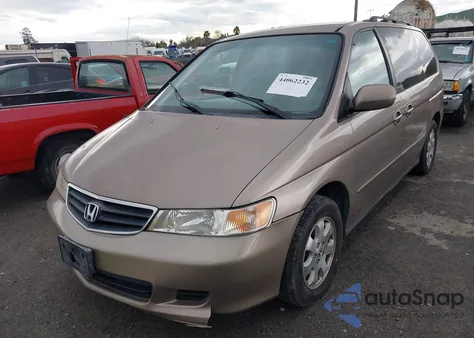 2004 Honda Odyssey Ex-L z USA, uszkodzony, nr VIN 5FNRL18724B074727